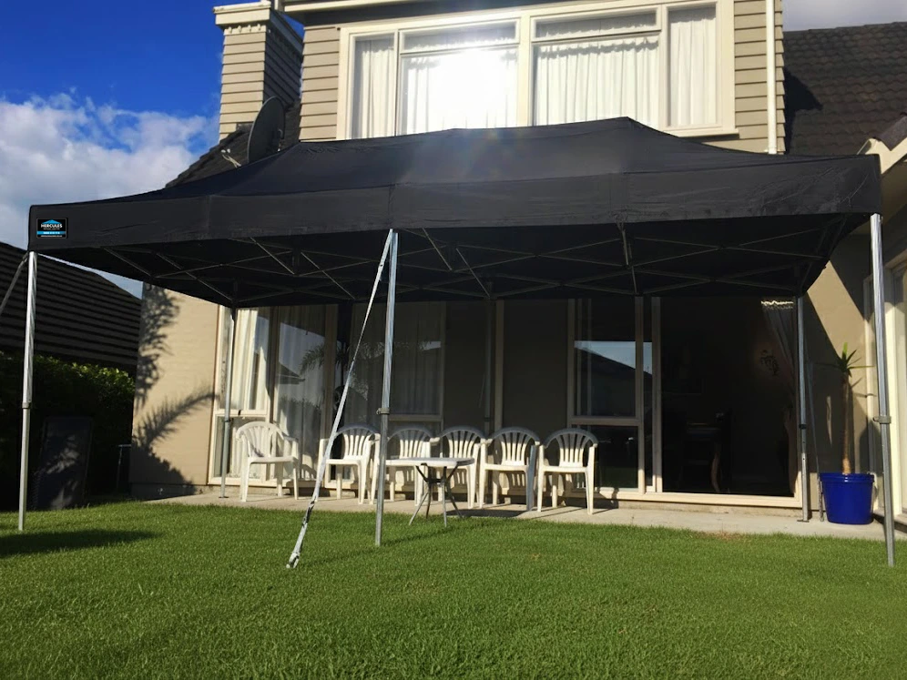 Family enjoying outdoor under a heavy duty Hercules gazebo