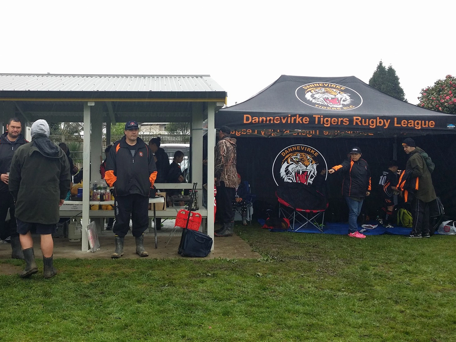 Sports club gazebo providing sideline shelter for players and coaches at a New Zealand spring fixture