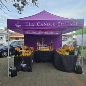The candle cottage used their purple gazebo at a local market