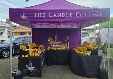The candle cottage used their purple gazebo at a local market